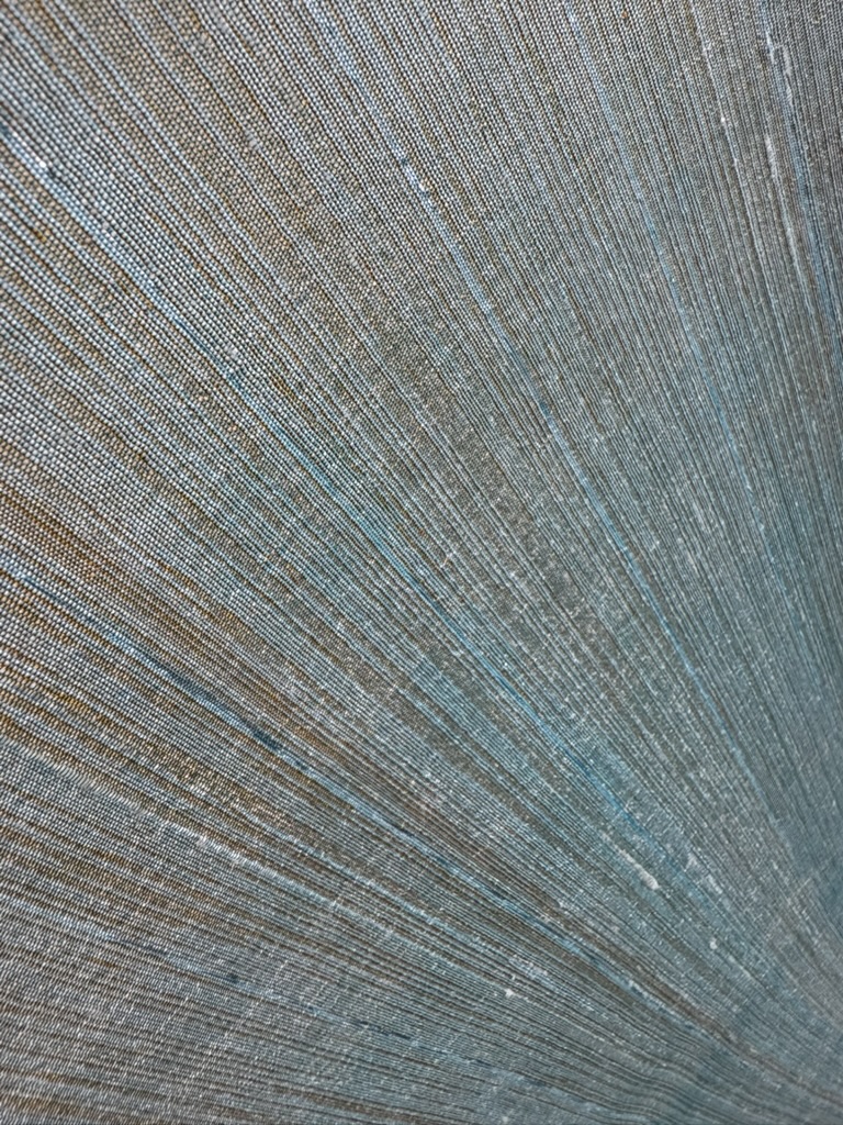 Natural silk weave beneath the Ascend artwork