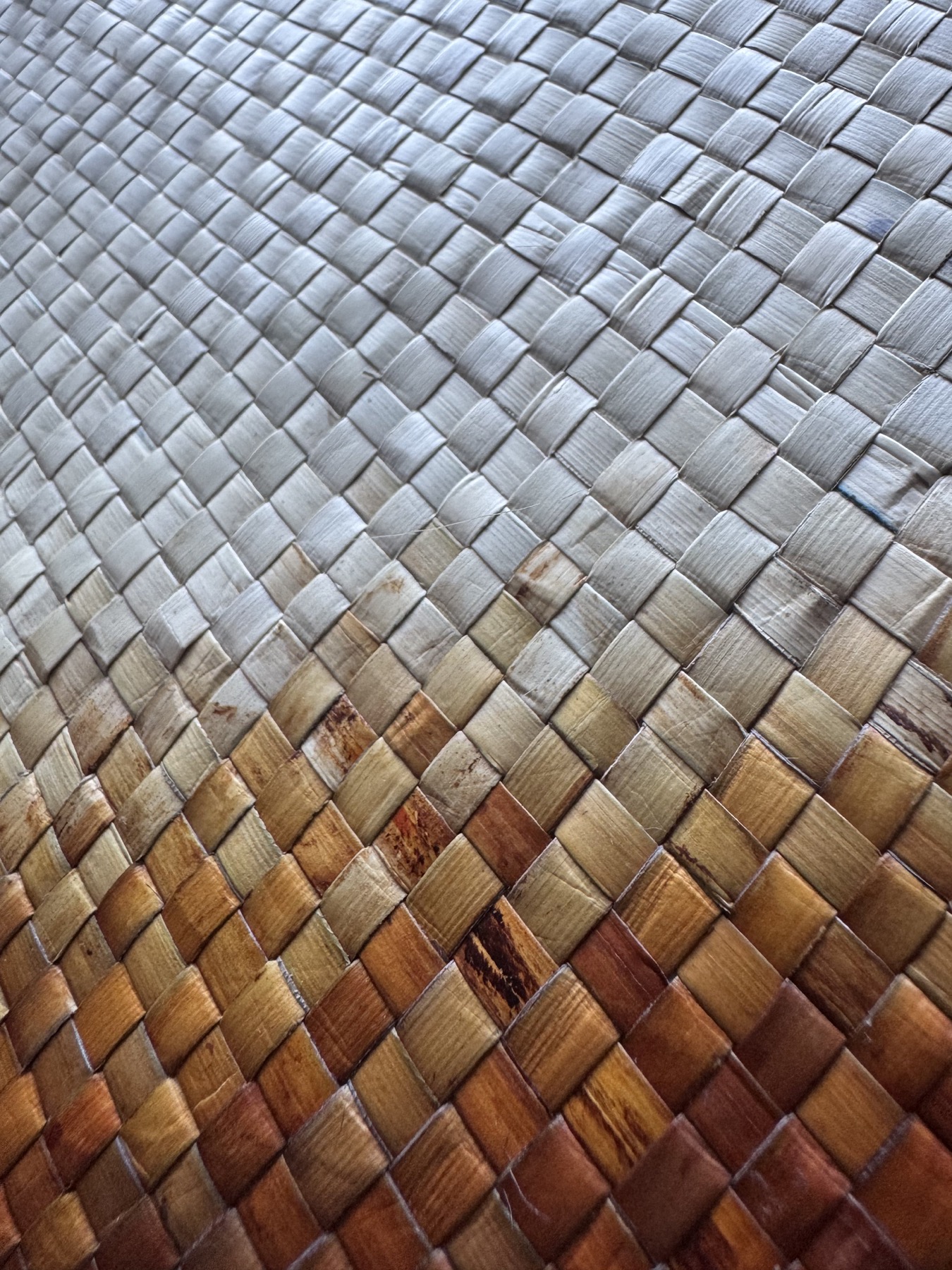 Natural and warm-toned pandanus weave, close detail